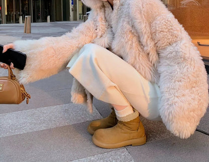 Bottes CozyStep™ en fourrure synthétique pour une chaleur élégante.